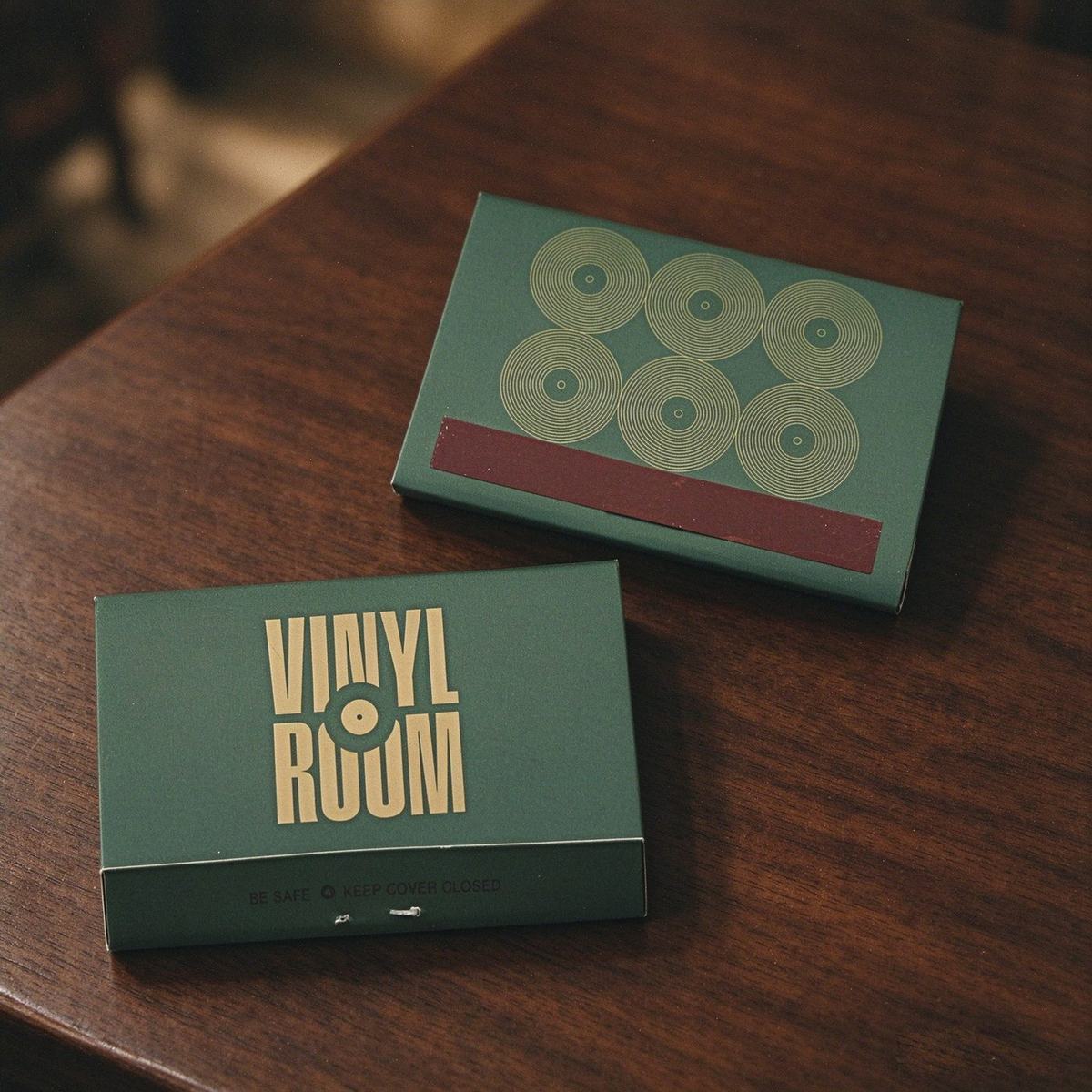 Dark green luxury matchboxes with pattern print for the West Room brand